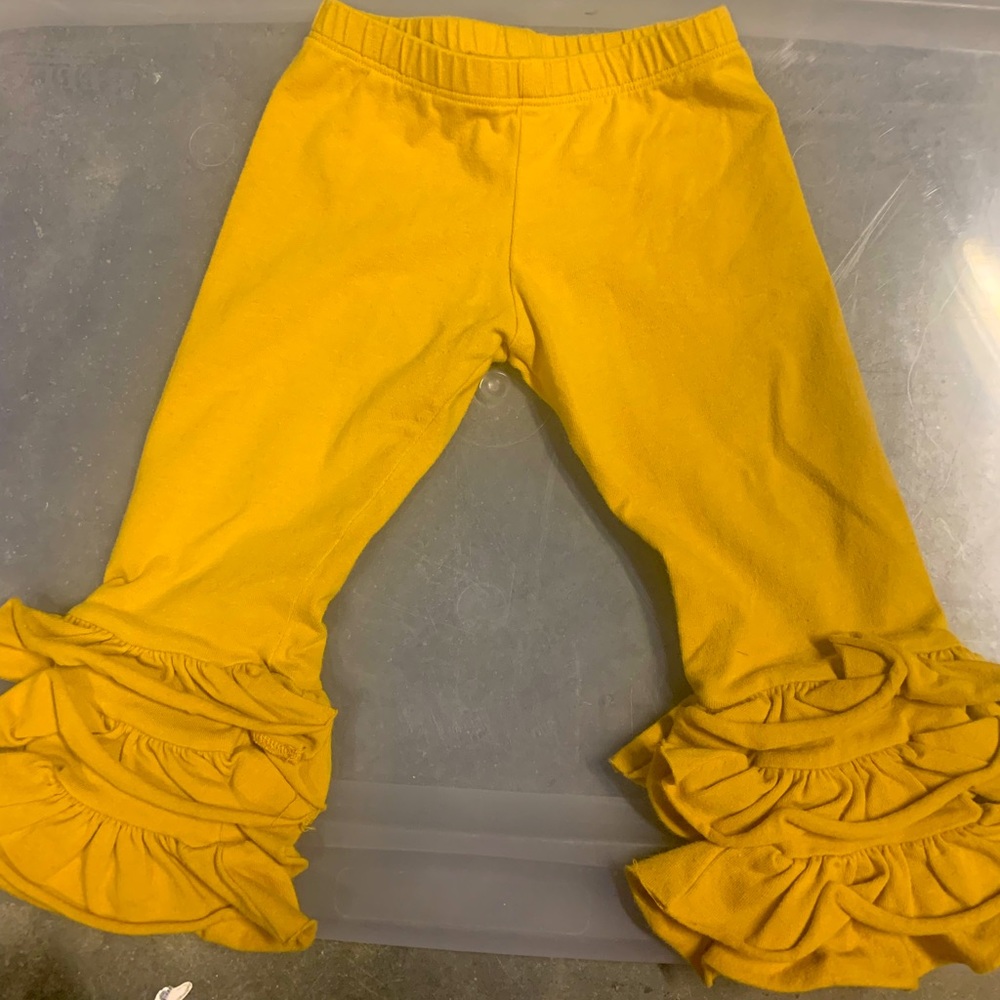 Persnickety 12 month gold ruffle pants. Smoke free home.